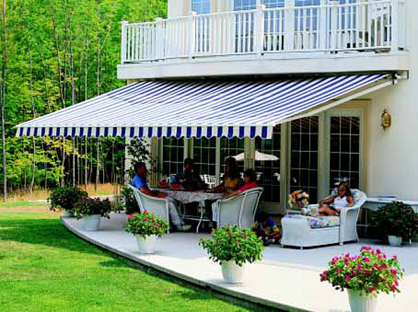 retractable awning cooling a home